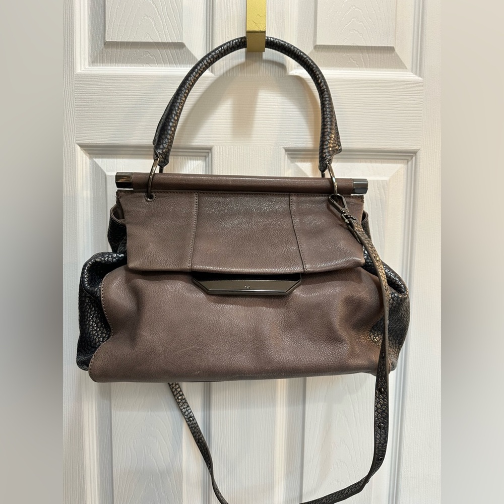 Grey and dark silver metallic top handle Halston Heritage handbag.